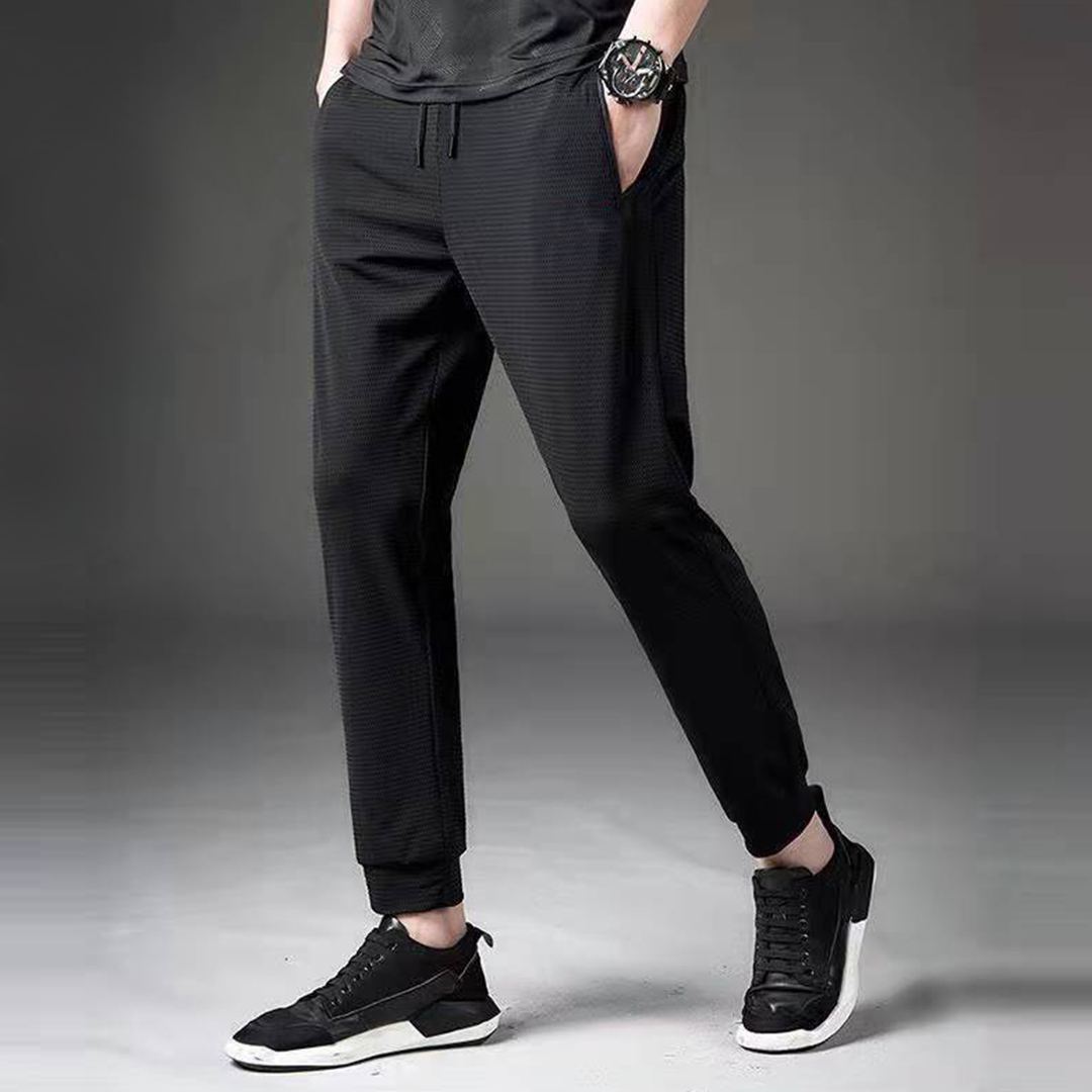 กางเกงวอร์มลายตาข่าย XD-101